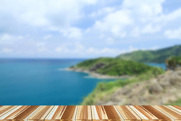 istock Perspective wood on sea background and summer 614626788