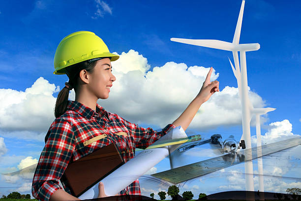 istock portrait women asia engineer working and holding blueprints 614628548