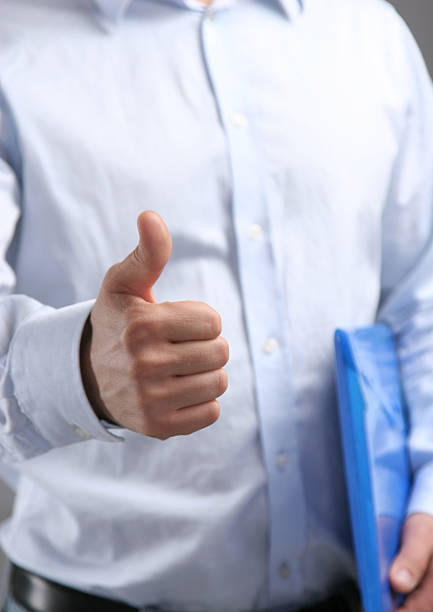 istock Business man offering his hand for handshake 614634354