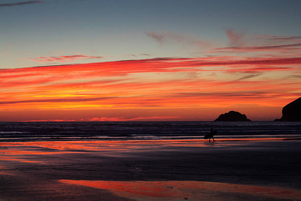 istock Colourful sunset over the beach at Polzeath 614635434