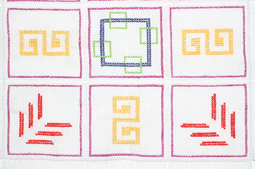 Embroidery with multi-colored pattern