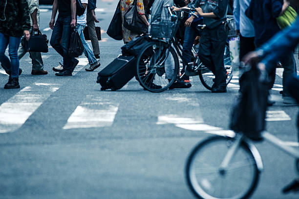istock Asian People are across the crosswalk 614636634