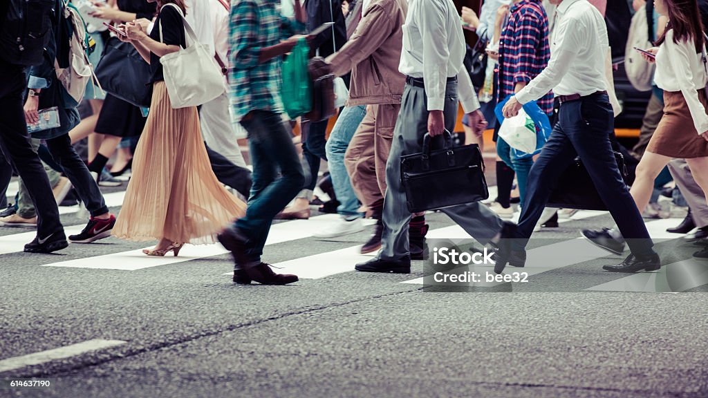 Asian People are across the crosswalk People Stock Photo