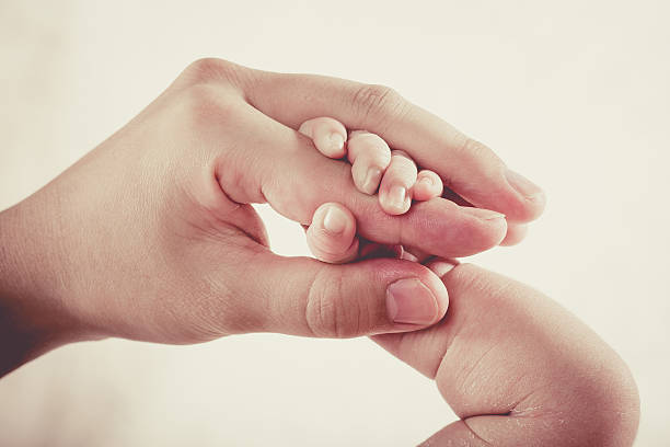 istock Newborn Body Parts 614638218