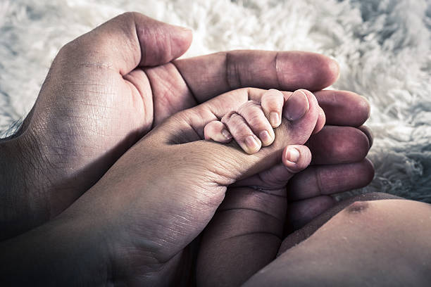 istock Newborn Body Parts 614639308
