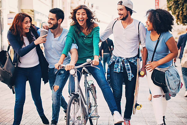 istock Happy friends on the street 614639984