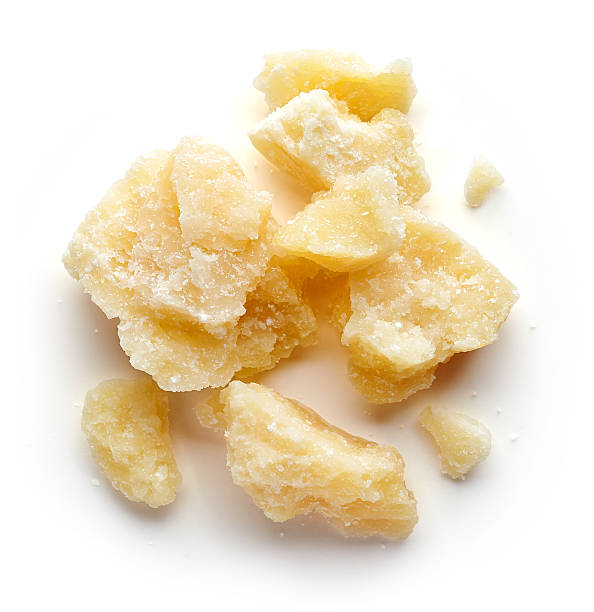 istock Parmesan cheese isolated on white background 614640820