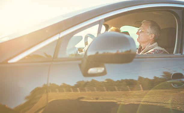 istock Senior couple enjoying a drive 614643450