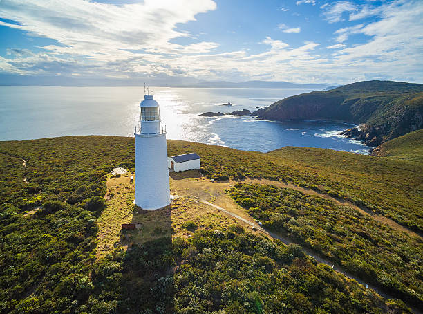 Aerial view of Bruny Island Lighthouse at sunset, Tasmania. stock photo