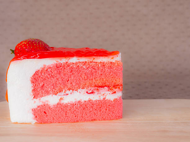 istock Strawberry Cake on cutting boards. on Wooden table . 614643872