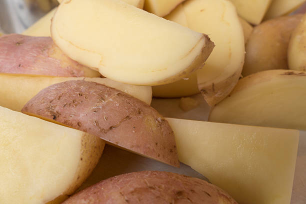 istock Raw potato slices, close-up 614646386