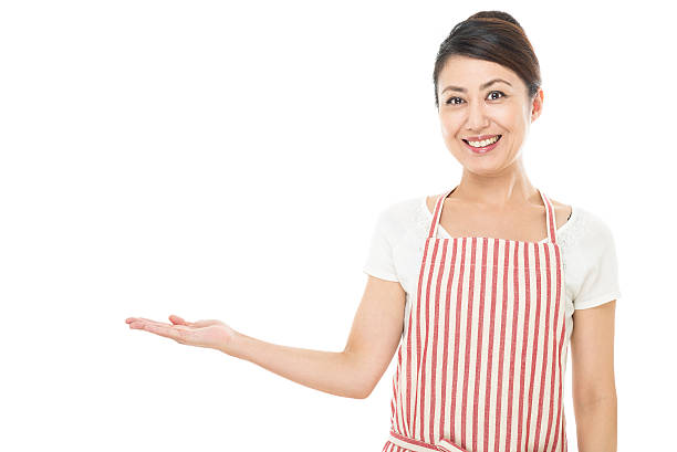 istock Asian woman wearing an apron 614647840