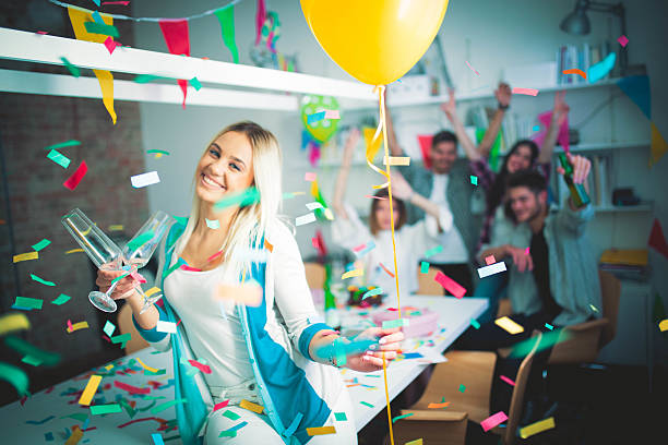 istock Businesswoman on a party 614648762