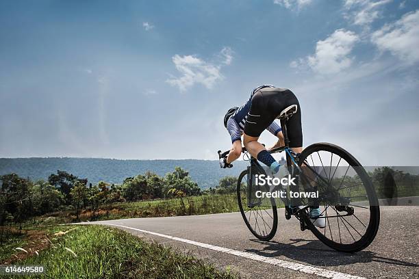 Men Cycling Road Bike In The Morning Stock Photo - Download Image Now - Adult, Adventure, Asia