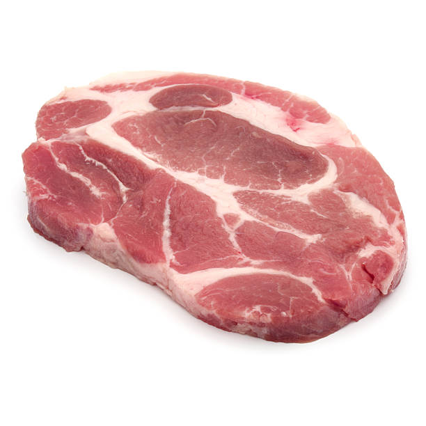 istock Raw pork chop meat isolated on white background cutout 614650690