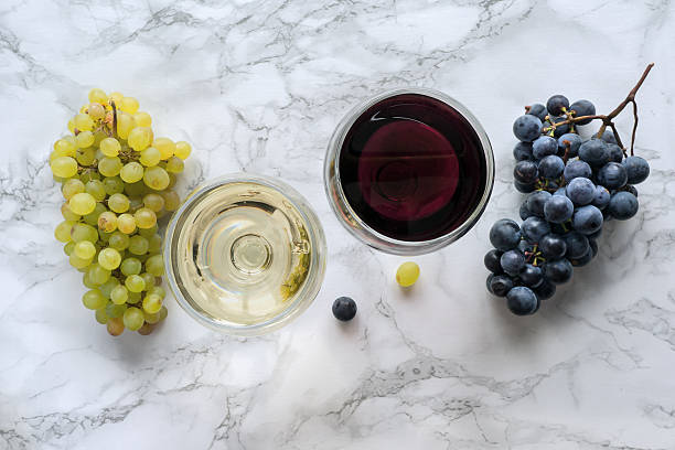 Wine on marble table stock photo