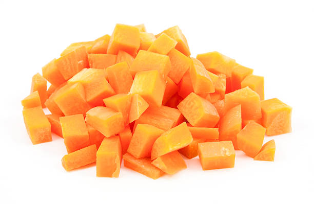 istock chopped and sliced carrot on white 614650944