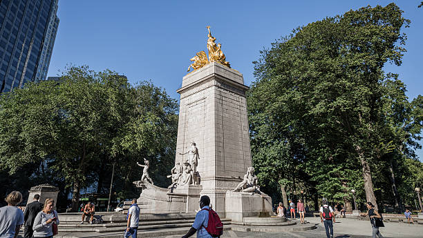 The Maine Monument, Manhatten, New York City, United States New York City, United States - September 22, 2016: The Maine Monument at the Merchant's Gate entrance to Central Park, Manhatten, New York City, United States. merchants gate stock pictures, royalty-free photos & images