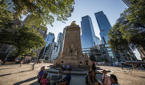 The Maine Monument, Manhatten, New York City, United States New York City, United States - September 22, 2016: The Maine Monument at the Merchant's Gate entrance to Central Park, Manhatten, New York City, United States. merchants gate stock pictures, royalty-free photos & images