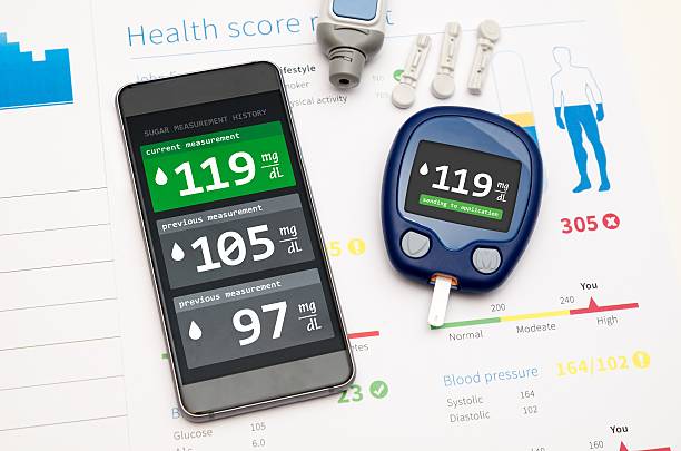 application pour le diabète sur smartphone - blood sugar test examining instrument of measurement diabetes photos et images de collection