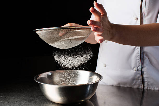 istock Woman hands kneading dough. 614704870