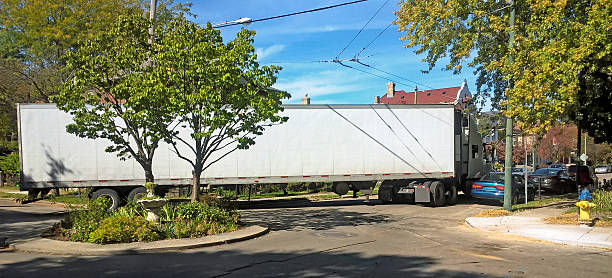 istock Semi-truck Negotiating a Tight Turn 614705658