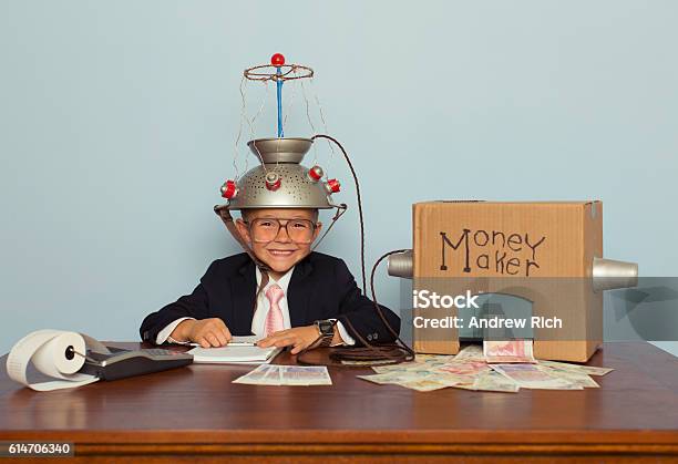 Young Businessman Makes Money With Homemade Money Machine Stock Photo - Download Image Now