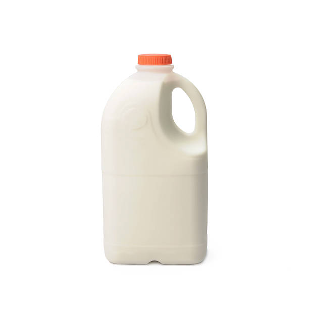istock Milk Bottle with Cap Isolated on White Background 614706900