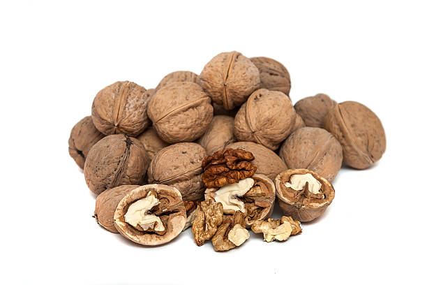 istock Group of walnuts Isolated on White Background 614707510