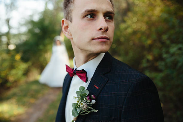 istock groom waiting for the bride 614708350