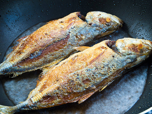 istock Sea fish frying in a Pan 614708788