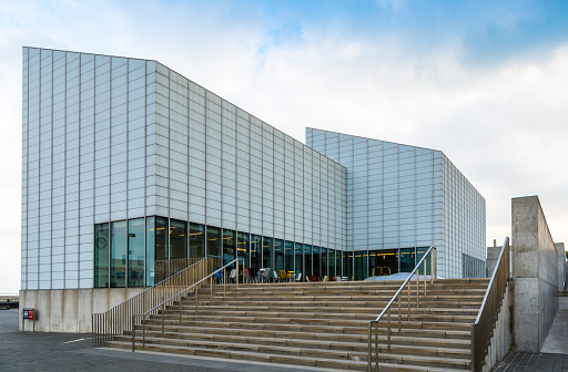 Margate, UK - October 14, 2016: Steps up to the front of the Turner Contemporary art gallery in Margate. A new public art gallery. Windows show cafe and shop area.