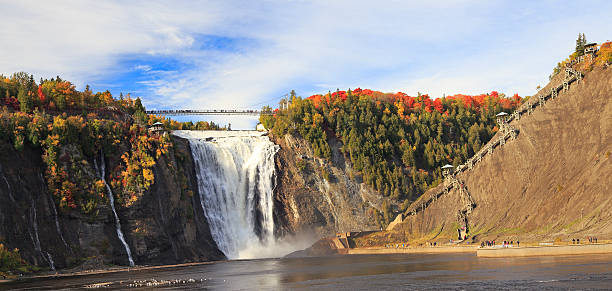 istock Montmorency Falls and Bridge in autumn, Canada 614713426