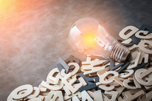 istock business ideas concept with glow light bulb 614714132