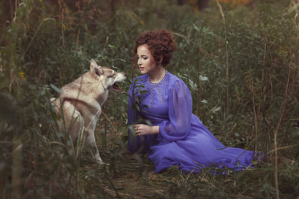 istock Girl is talking to the dog. 614714980