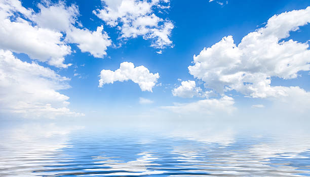 istock sea and cloudy blue sky 614715618