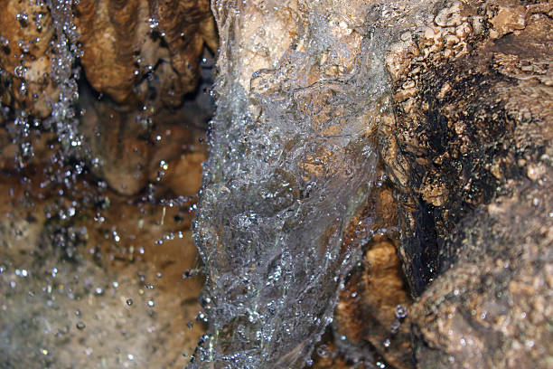Waterfall in the caves stock photo