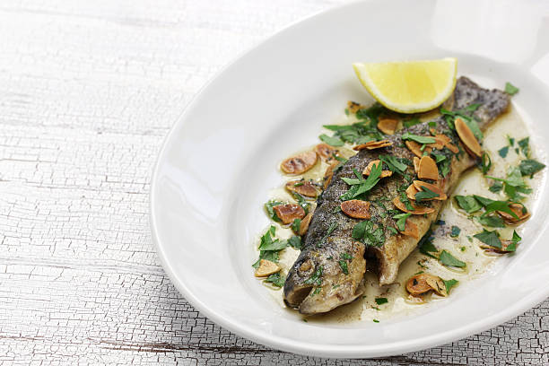 istock trout meuniere amandine 614717556