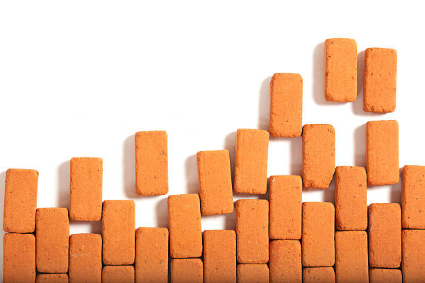 istock Not finished red brick wall background.Closeup 614722176