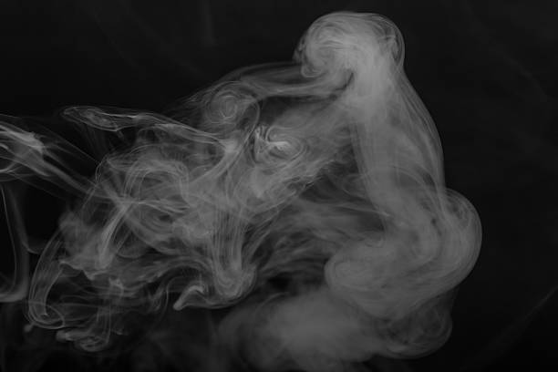 istock Cloud of smoke on black background. Selective focus 614723588