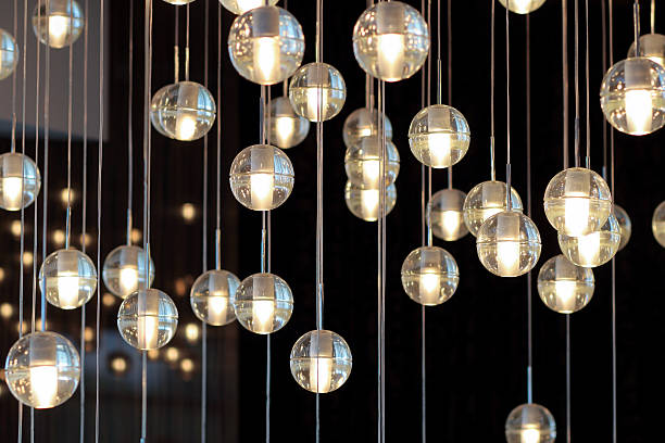 istock lamps on the dark background, selective focus, horizontal 614724960