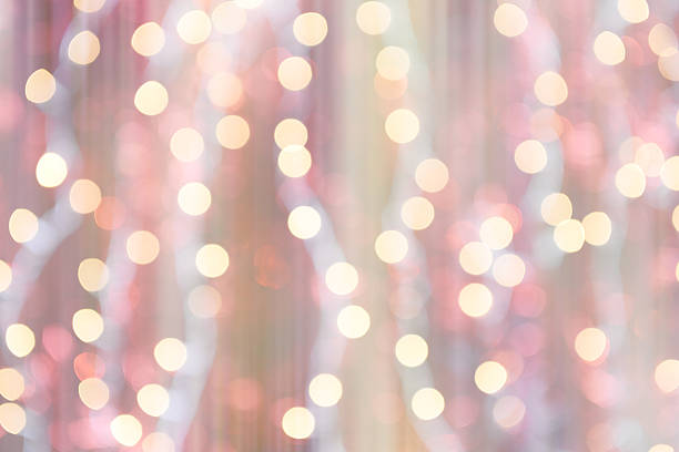 istock colorful abstract background blur motion with bokeh light 614725336
