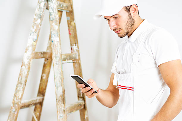 istock Portrait of young worker. 614726562