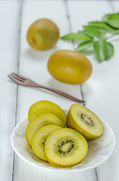 istock golden kiwi fruit 614726692