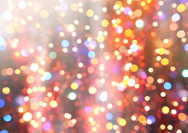 istock colorful abstract background blur motion with bokeh light 614726778