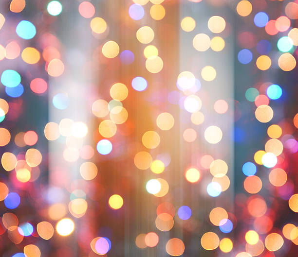 istock colorful abstract background blur motion with bokeh light 614727178