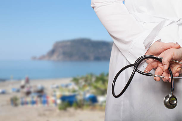The doctor put his hands with stethoscope
