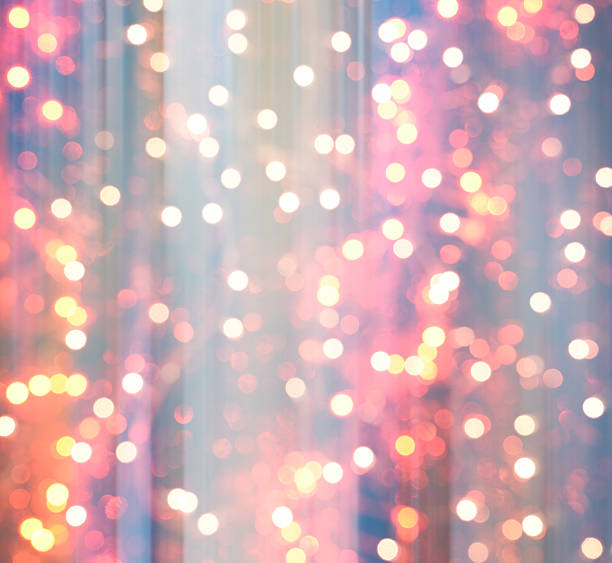 istock colorful abstract background blur motion with bokeh light 614731418