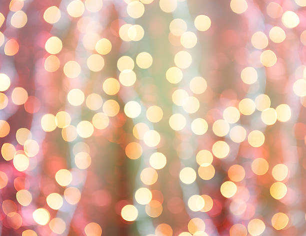istock colorful abstract background blur motion with bokeh light 614732138