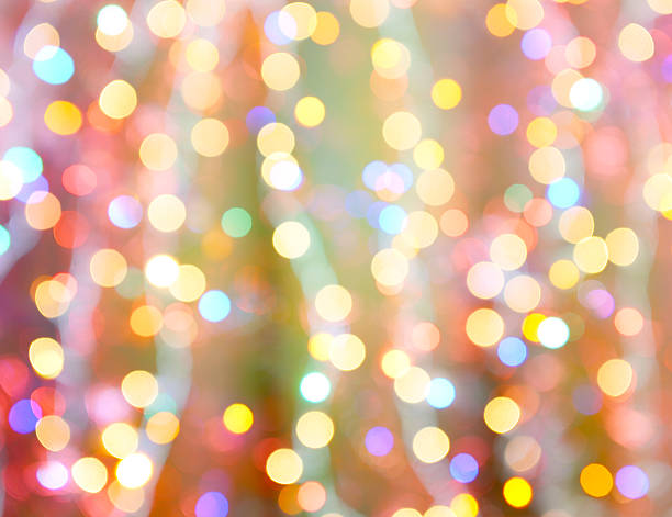 istock colorful abstract background blur motion with bokeh light 614732328